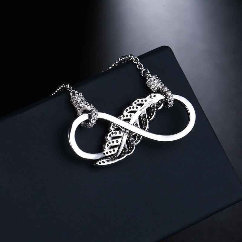 Feather Motif Sterling Silver Bracelet with White Gold Finish - Versatile Fashionable Design