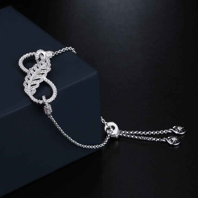 Feather Motif Sterling Silver Bracelet with White Gold Finish - Versatile Fashionable Design