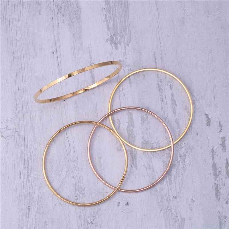 Fine Gold-Clad Titanium Steel Bracelet with Geometric Design and Multiple Sizes