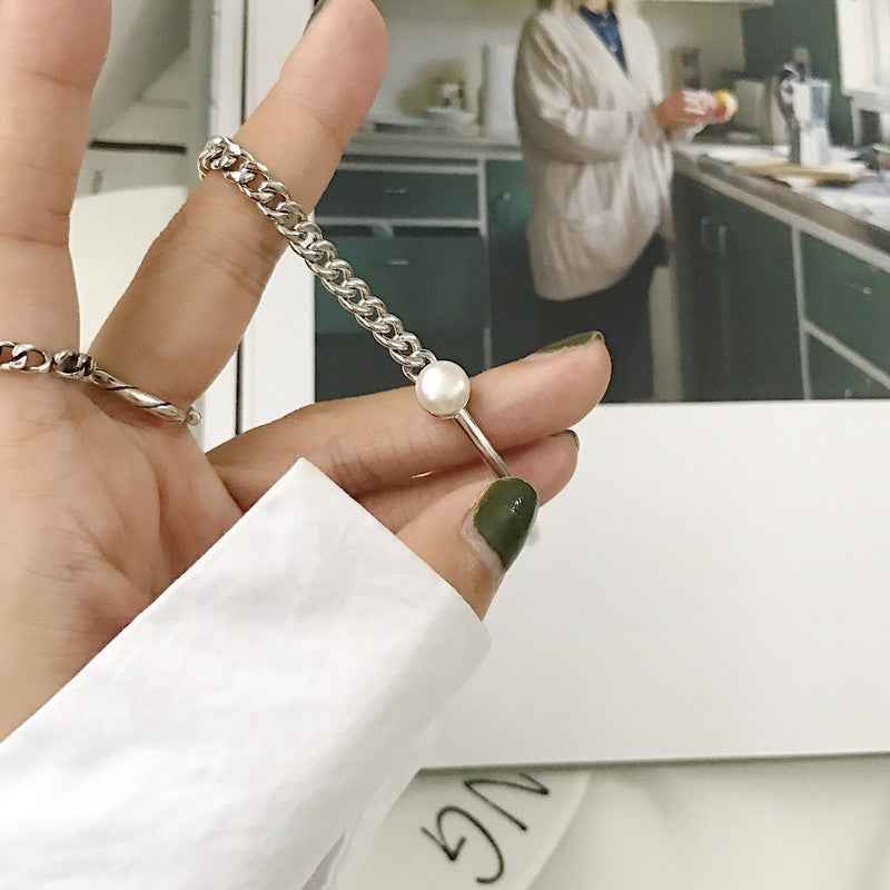 Asymmetrical Pearl Silver Bracelet with Geometric Modern Design and White Gold Finish