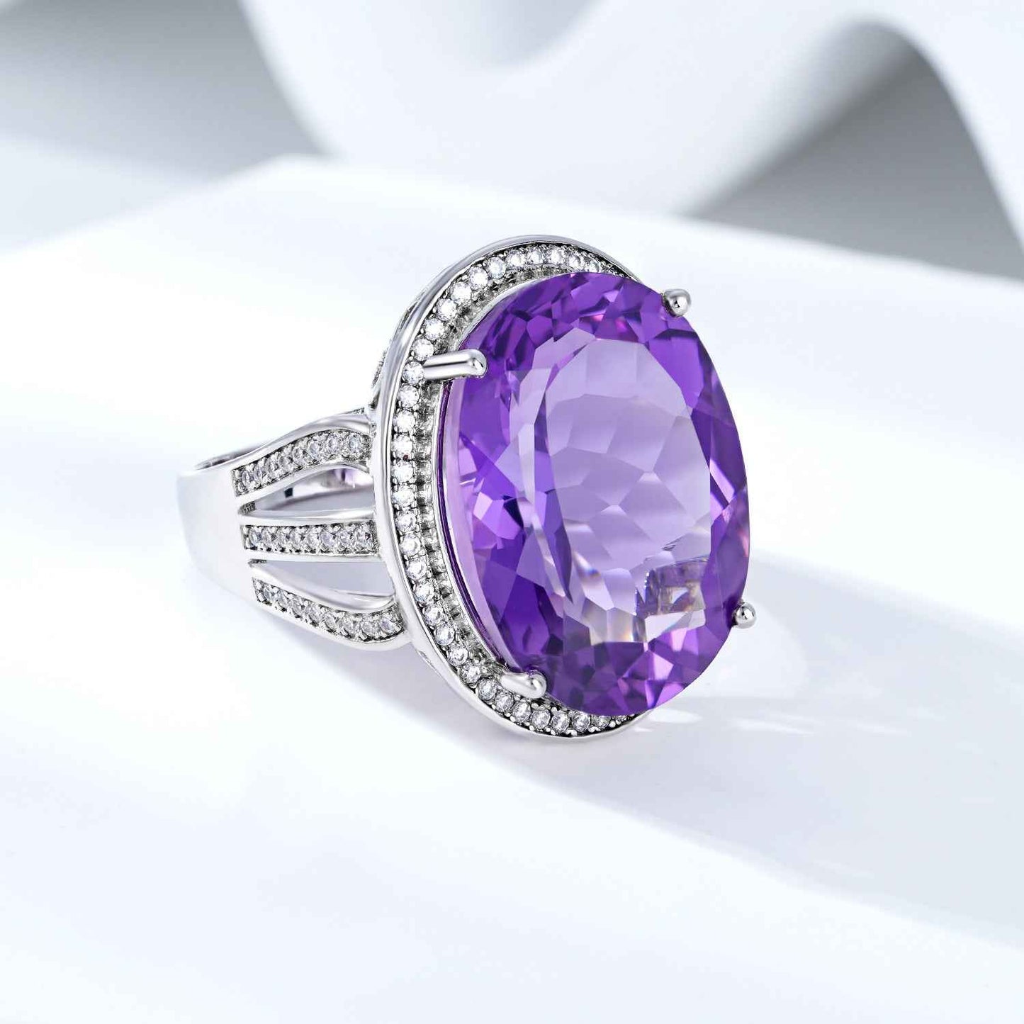 Grand Oval Amethyst Ring in Sterling Silver Halo Design