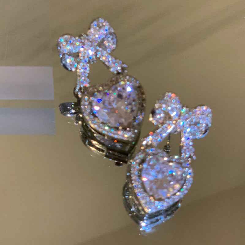 Romantic Heart Drop Earrings with Pave Bow Design