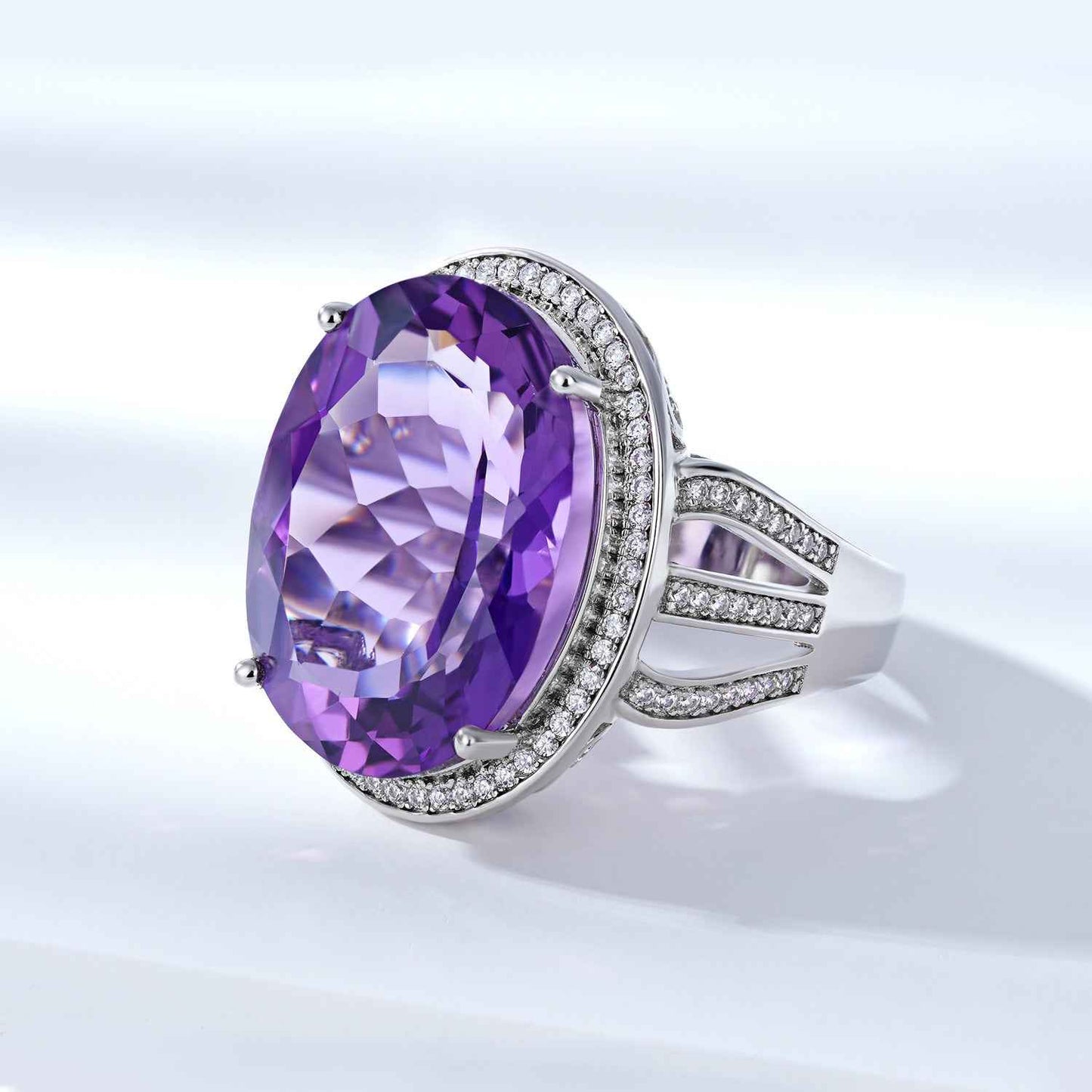 Grand Oval Amethyst Ring in Sterling Silver Halo Design