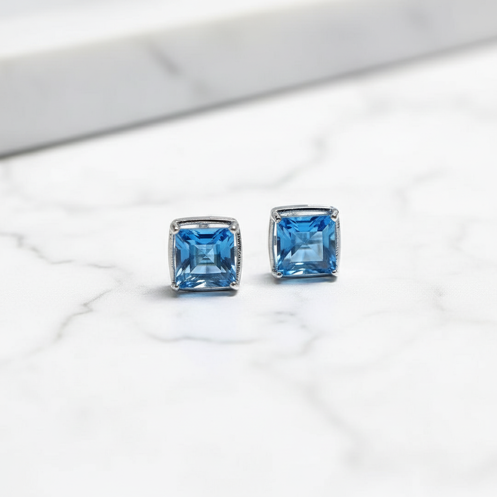 Natural Blue Topaz Stud Earrings – 925 Sterling Silver, Triple-Plated Platinum & Rose Gold - Eterna